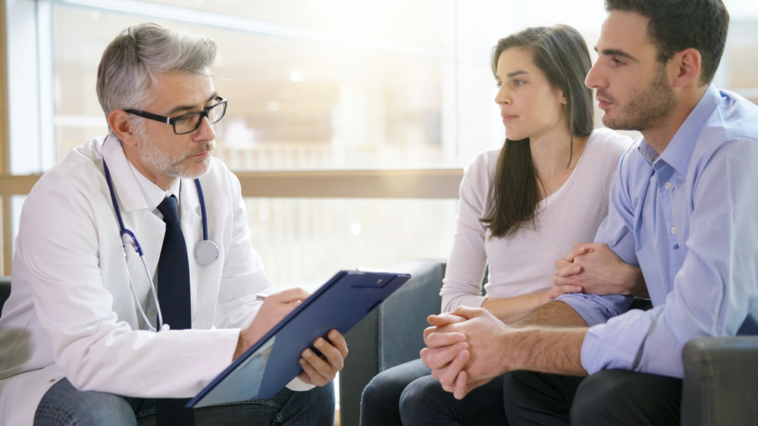 A couple defies the doctor's advice and has a baby; two years later, the doctor says, "I warned you."