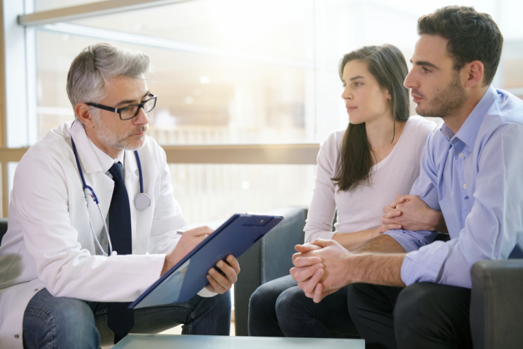 A couple defies the doctor's advice and has a baby; two years later, the doctor says, "I warned you."