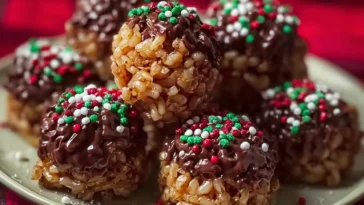 Christmas Chocolate Rice Krispie Balls on a Festive Plate