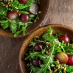 Arugula Salad with Grapes and Sunflower Seeds Bowl