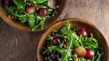 Arugula Salad with Grapes and Sunflower Seeds Bowl
