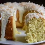 Coconut Coconut Milk Cake Slice on a Plate