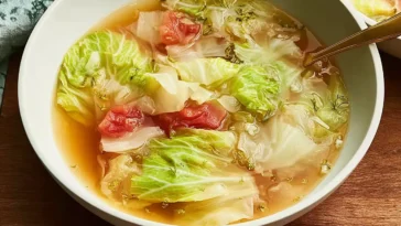 Healing Cabbage Soup in a Bowl Featuring Fresh Ingredients