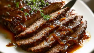 Savory Slow Cooker Brisket - Cozy Dinner