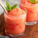 Strawberry Lemonade Slushie in a Glass with Fresh Berries