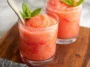 Strawberry Lemonade Slushie in a Glass with Fresh Berries