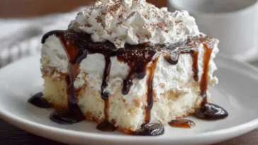 Indulge in The White Russian Poke Cake - Easy Boozy Dessert