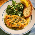 Chicken Paillard with Lemon-Herb Butter Sauce on Plate