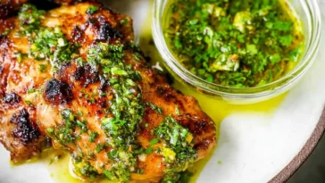 Delicious Chimichurri Chicken Thighs Served with Fresh Herbs