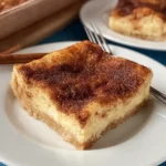 Easy Churro Cheesecake Bars on a Plate
