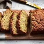 Easy Gluten-Free Zucchini Bread: Delightfully Moist & Tasty! 5 Sliced Easy Gluten-Free Zucchini Bread on a Plate