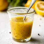 Lemon Vinaigrette in a jar with fresh ingredients