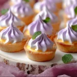 Mini Lemon Tart with Lilac Meringue on Elegant Serving Plate