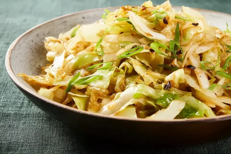 Super Easy Cabbage Stir Fry on a Colorful Plate
