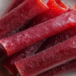 Colorful 3-Ingredient Homemade Fruit Roll-Ups on a Plate