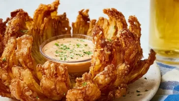 Delicious Blooming Onion Served with Dipping Sauce