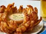 Delicious Blooming Onion Served with Dipping Sauce
