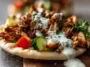 Delicious Chicken Shawarma with Garlic Sauce on a Plate