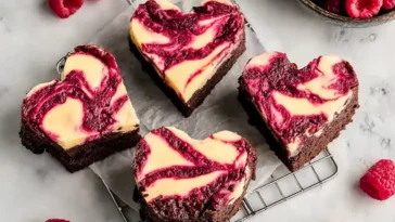 Heart Shaped Brownies with Raspberry Swirl and Cheesecake Topping