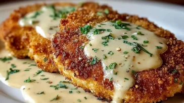 Delicious Parmesan Crusted Chicken with Creamy Garlic Sauce