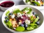 Tasty Easter Spring Salad with Goat Cheese on a Bright Table