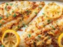 Baked Tilapia on a Dinner Plate with Lemon