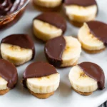 Chocolate Peanut Butter Banana Bites: Irresistibly Delicious! 15 Chocolate Peanut Butter Banana Bites on a Plate