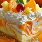 No-Bake Orange Pineapple Swirl Cheesecake Recipe Delight 5 No-Bake Orange Pineapple Swirl Cheesecake Slice