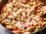 Delicious Chicken Cheesesteak Skillet in a Cast Iron Pan