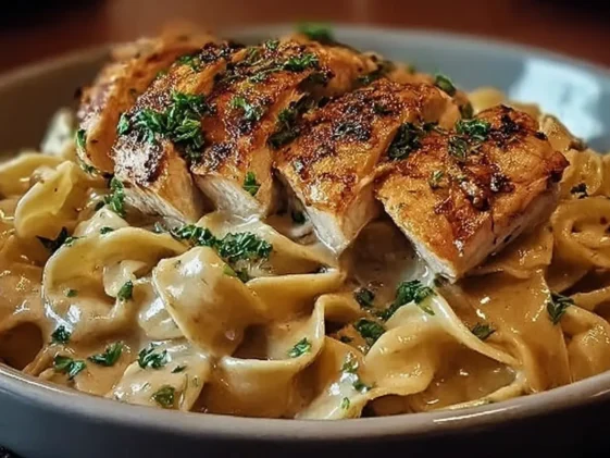 Delicious Chicken with Buttered Noodles on a Plate