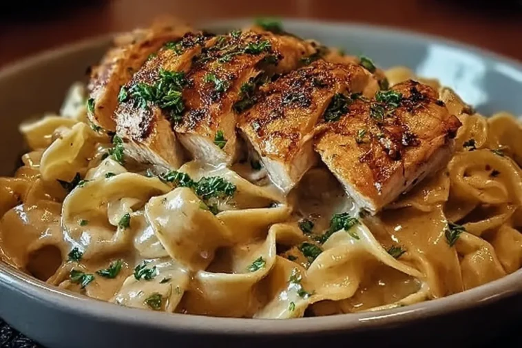 Delicious Chicken with Buttered Noodles on a Plate