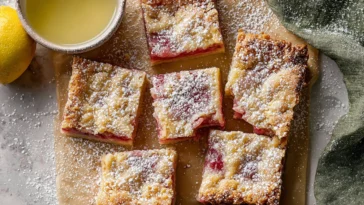 Delicious Lemon Rhubarb Bars on a White Plate