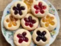 Colorful Flower Jam Thumbprint Cookies on a Plate
