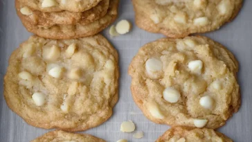 Keto White Chocolate Macadamia Nut Cookies on a Plate