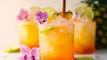 "Pineapple Mango Rum Punch in a Tropical Glass"