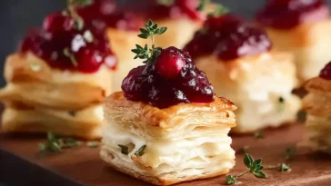 Puff Pastry Cranberry Brie Bites on a Serving Platter