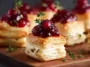 Puff Pastry Cranberry Brie Bites on a Serving Platter