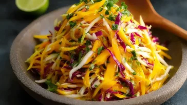 Quick And Easy Mango Slaw Served in a Bowl