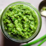Quick & Fresh Garlic Scape Pesto in a Bowl with Herbs