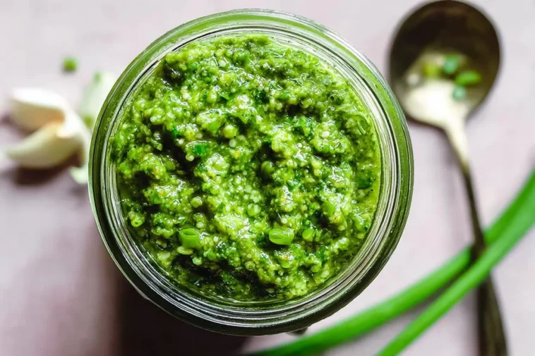 Quick & Fresh Garlic Scape Pesto: A Flavorful Delight 3 Quick & Fresh Garlic Scape Pesto in a Bowl with Herbs