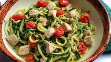 Zucchini Noodles with Chicken and Tomatoes in Lemon Garlic Sauce