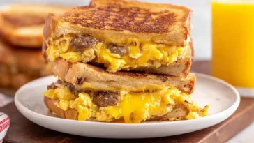 Delicious Breakfast Grilled Cheese Sandwich with Eggs and Sausage