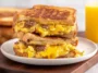 Delicious Breakfast Grilled Cheese Sandwich with Eggs and Sausage