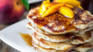 Delicious Brown Sugar Peach Pancakes Stacked High