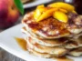 Delicious Brown Sugar Peach Pancakes Stacked High