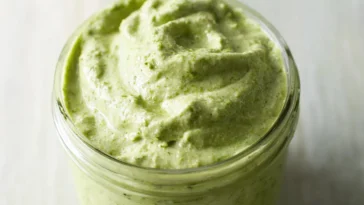 Creamy Pesto Sauce Served Over Pasta