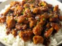 Easy Bourbon Chicken Plated with Fresh Garnish