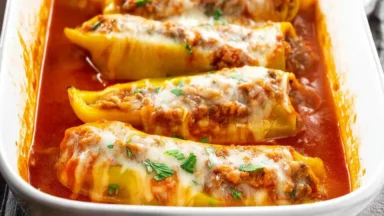 Italian Sausage Stuffed Banana Peppers on a Serving Plate