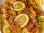 Lemon Chicken with Lemon Butter Sauce on a Plate