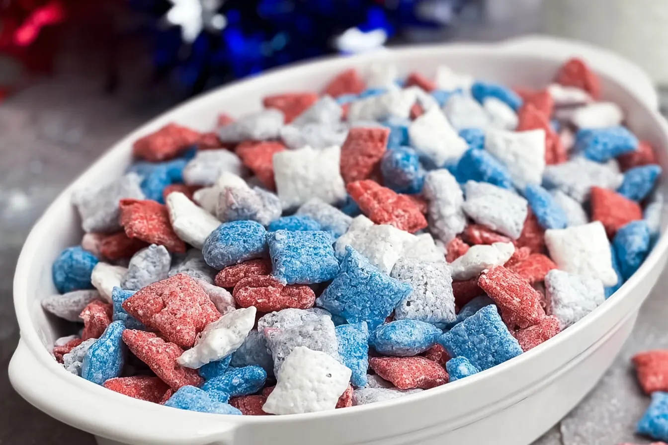 Patriotic Muddy Buddies: Celebrate with This Fun Treat! 3 Patriotic Muddy Buddies in a Bowl